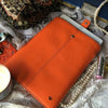 NueVue iPad case orange vegan leather with self cleaning interior lifestyle 2