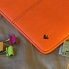 NueVue iPad case orange vegan leather with self cleaning interior lifestyle 3