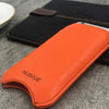 NueVue iPhone 6 Plus Orange Pouch cleaning case lifestyle 3