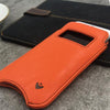 iPhone 8/7 Orange Faux Leather Case Lifestyle 1