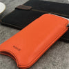 NueVue iPhone 13 mini case orange vegan leather self cleaning interior lifestyle